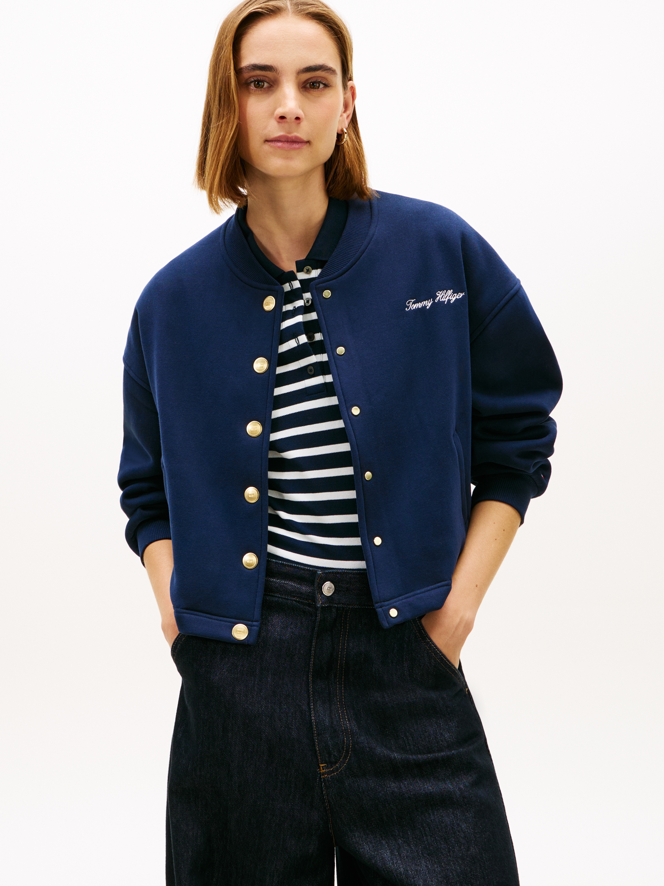 Strickjacke TOMMY HILFIGER "GOLD BTN HWK BOMBER", Damen, Gr. L (40), schwarz night navy, Strick, Obermaterial: 64% Baumwolle, 36% Polyester, unifarben, regular fit, Rundhals, Rippbündchen, Strickjacken Strickjacke, mit goldfarbenen Knöpfen