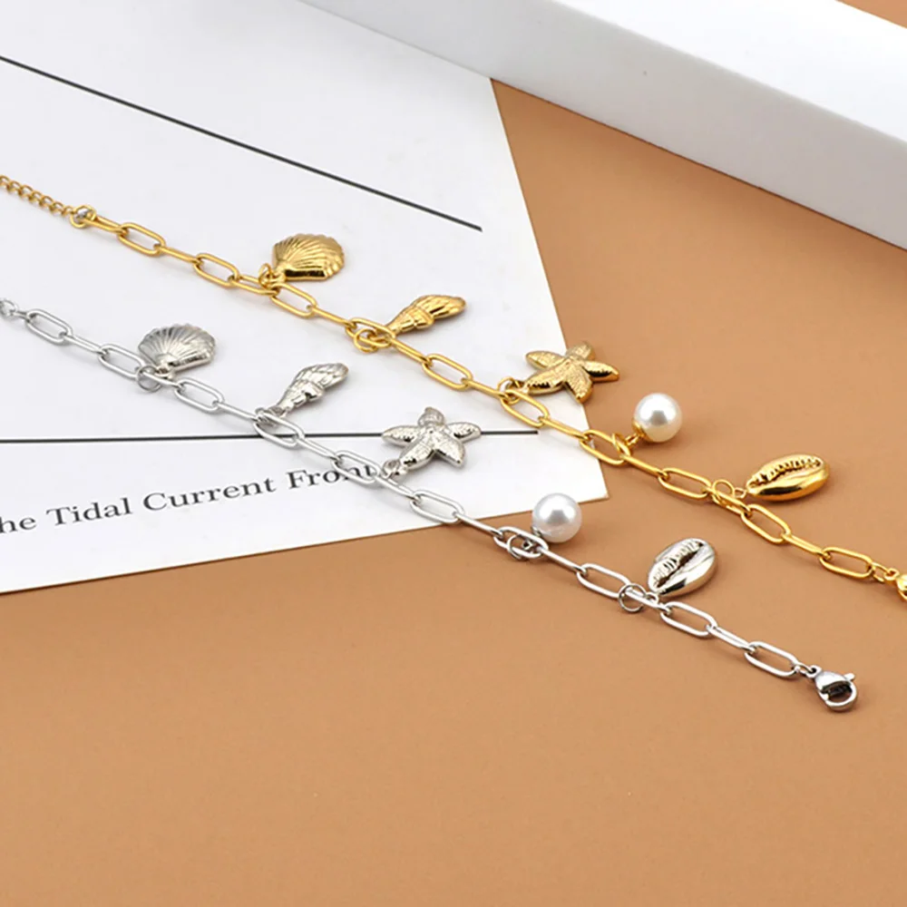 JeeMango Damen vergoldetes Meer-Armband, Edelstahl, Muschelschale, Seestern, Charm-Schmuck, wasserdicht, modischer Armreif B25060 Image