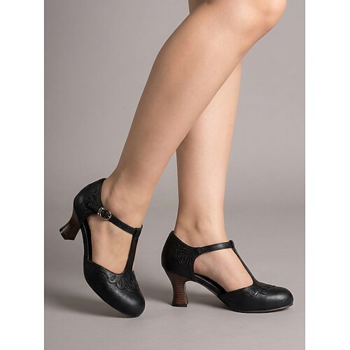 Vintage-Pumps mit T-Riemen im Stil der 1920er Jahre – elegante schwarz-weiße Flapper-Pumps mit Muschelkanten für Great-Gatsby-Partys und Retro-Hochzeiten Veranstaltungen der Goldenen Zwanziger Image