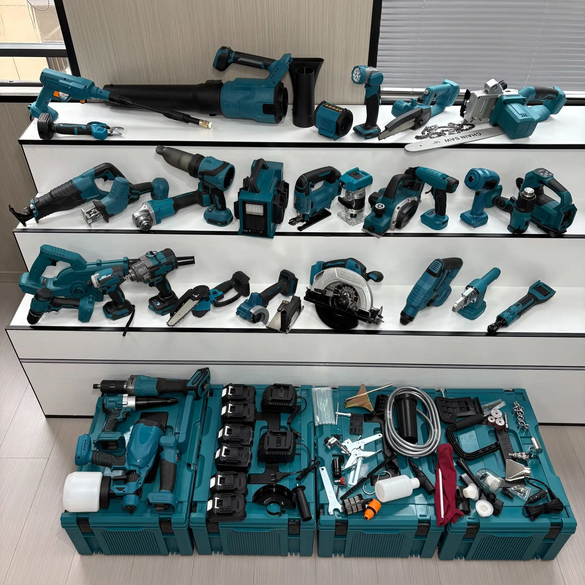 33-teiliges Akku-Werkzeugset Elektrischer Bohrhammer Bürstenloser Winkelschleifer Kabelloser Schrauber Tragbare Säge Kombinations-Werkzeugset Image