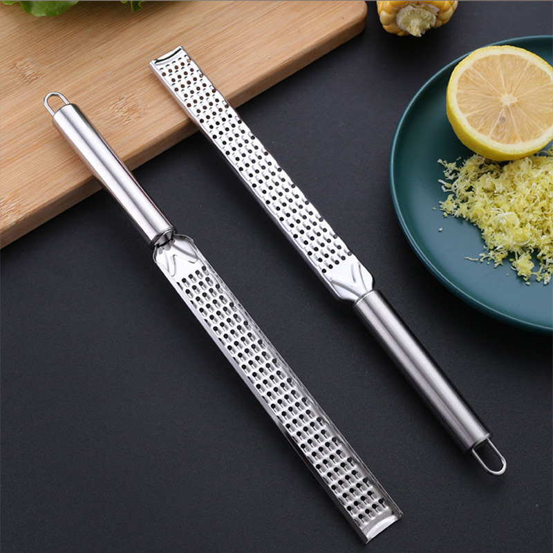 Premium Stainless Steel Grater Lemon Zester Ginger Garlic Cheese Microplane. Premium Stainless Steel Grater Lemon Zester Ginger Garlic Cheese Microplane.