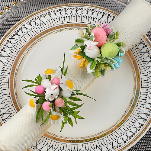 6 Stück Serviettenringe mit Osterhasenmotiv, frühlingshafte Serviettenhalter mit Hasen, gesprenkelten Eiern und Gänseblümchen, Tischdekoration im Landhausstil für die Osterfeier, Serviettenringe mit Grünpflanzen Image