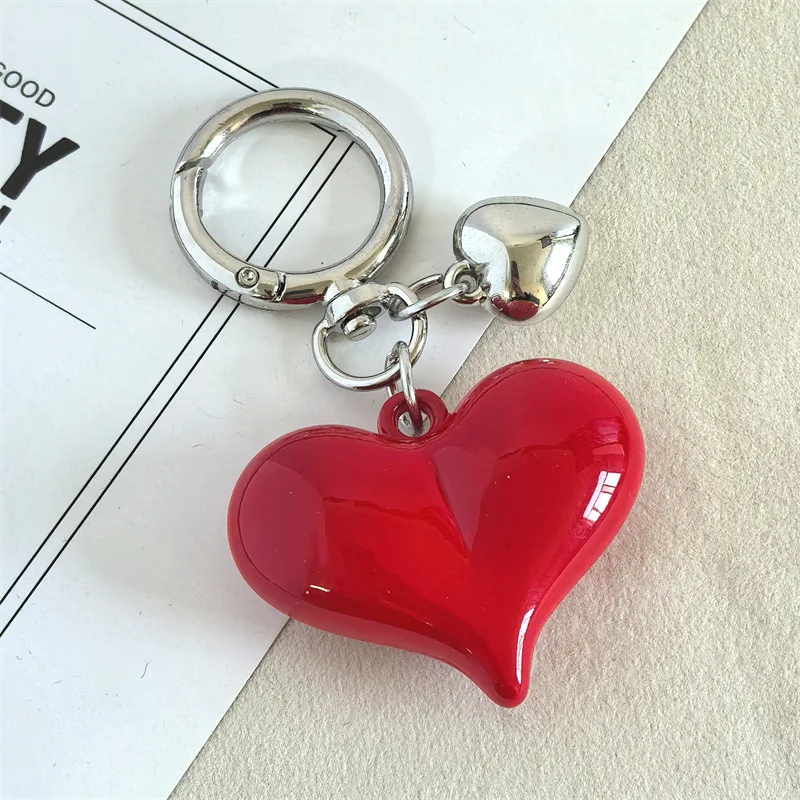 Commercio all'ingrosso 3D in resina a forma di cuore portachiavi con decorazione per auricolari ciondolo portachiavi borsa portachiavi portachiavi per auto portachiavi gioielli regali per le donne