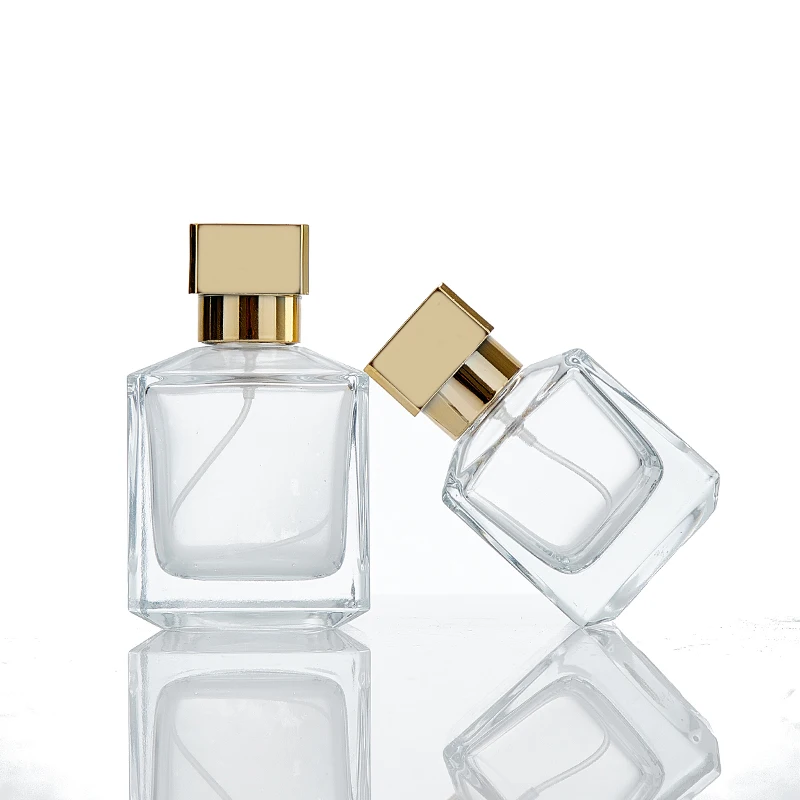 Commercio all'ingrosso OEM personalizzato vuoto quadrato 30ml 50ml 100ml bottiglia di profumo di vetro trasparente bottiglia di profumo con tappo dorato