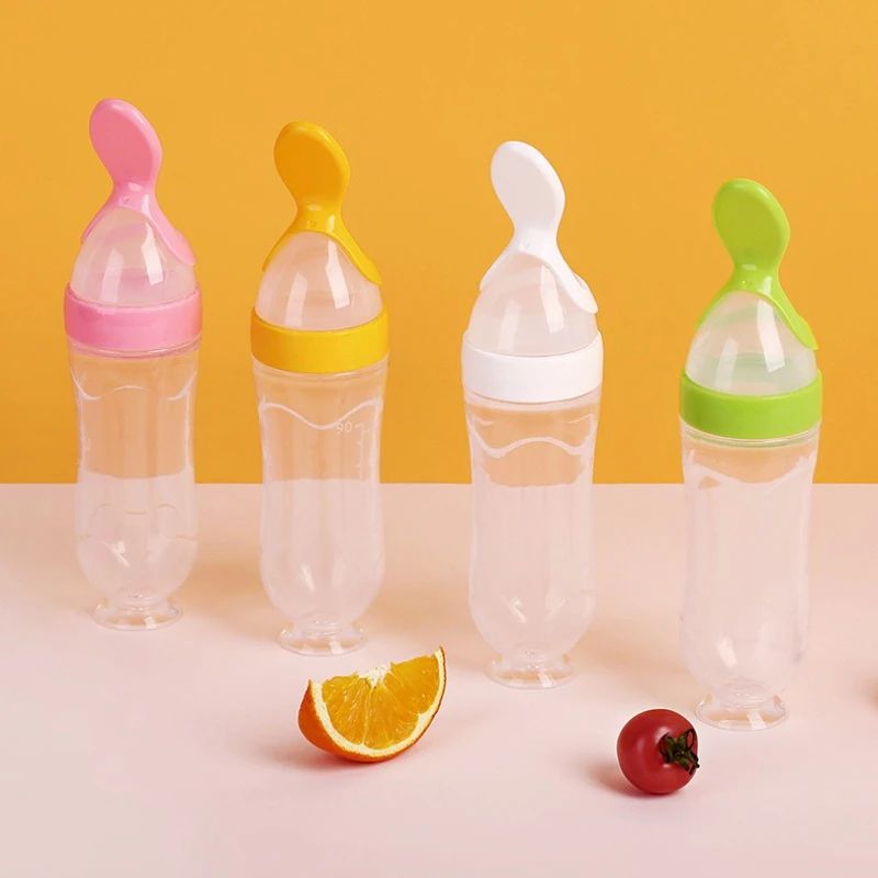 Silicone Baby Feeding Bottle With Squeeze Spoon Dispenser pink
