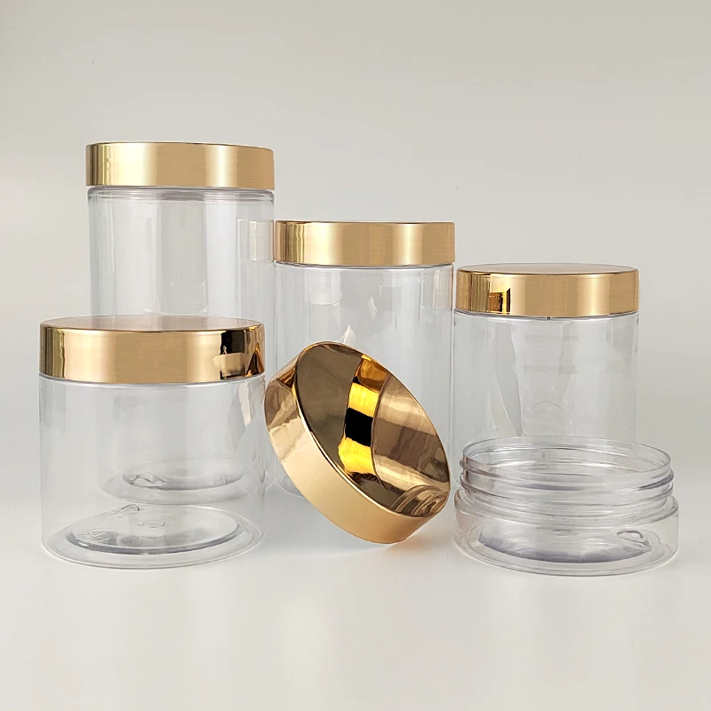 Commercio all'ingrosso 50ml 60ml 80ml 100ml 120ml 150ml 200ml 250ml 300ml 400ml barattolo contenitore in plastica trasparente PET con coperchio dorato