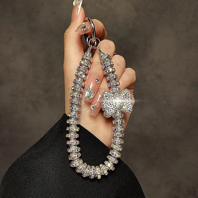 Neue Luxus Funkelnden Diamant Bogen Telefon Kette Handheld Handgelenk Strap Kurze Armband Kette Anti Verlust Anhänger Hängen Seil Universal Image