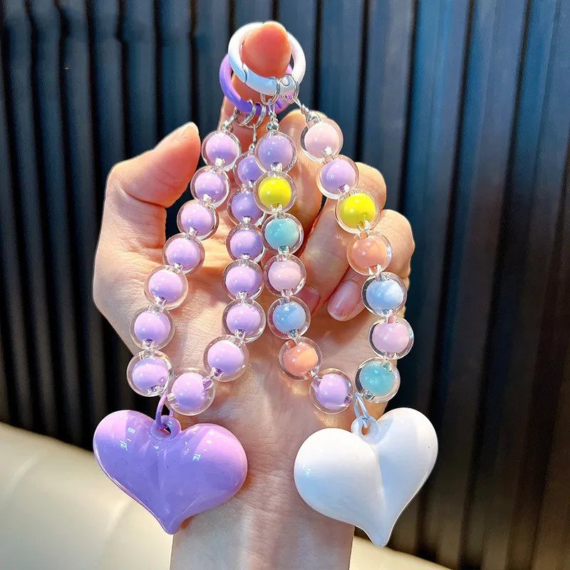 Commercio all'ingrosso in acrilico con perline e Macaron borsa ciondoli portachiavi per auto carino 3D con perline a cuore custodia per telefono cellulare portachiavi