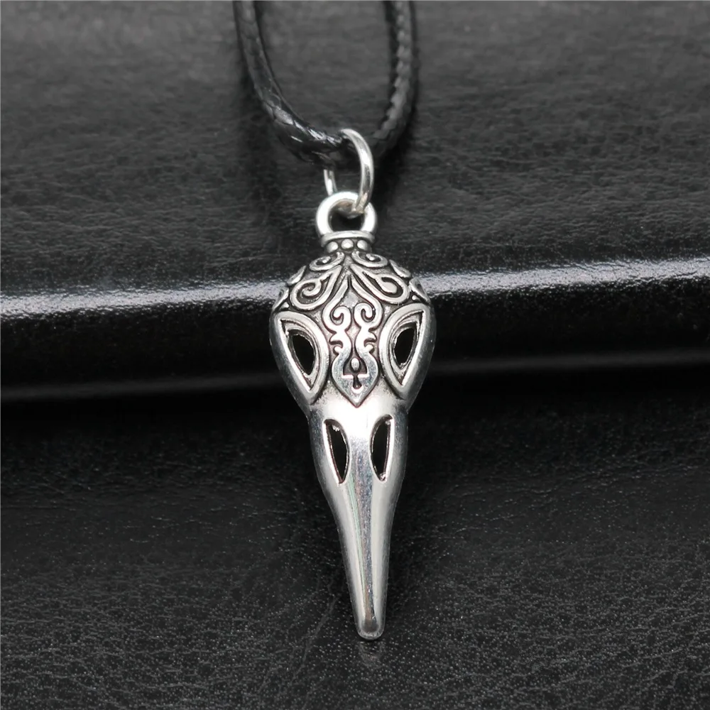 Collana unisex retrò vintage color argento antico 35x13mm teschio becco scheletro uccello pendente collana a catena in corda di cuoio nero finto