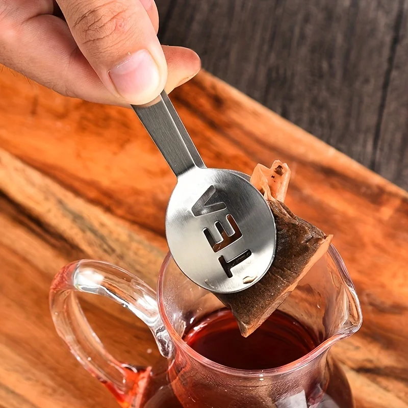 1pc Tee Beutel Squeezer Edelstahl Tee Beutel Zange Silber Tee Beutel Sieb Clip Tee Beutel Löffel Zum Lösen blatt Greifen Eiswürfel Image