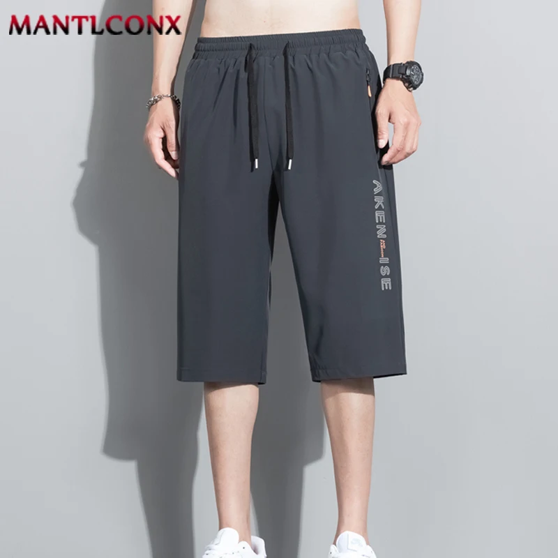 Modische Neue Bequeme Herren-Shorts mit Elastischem Bund, Atmungsaktive Schnelltrocknende Sportshorts für Männer, Kurze Hosen in Schwarz und Grau Image