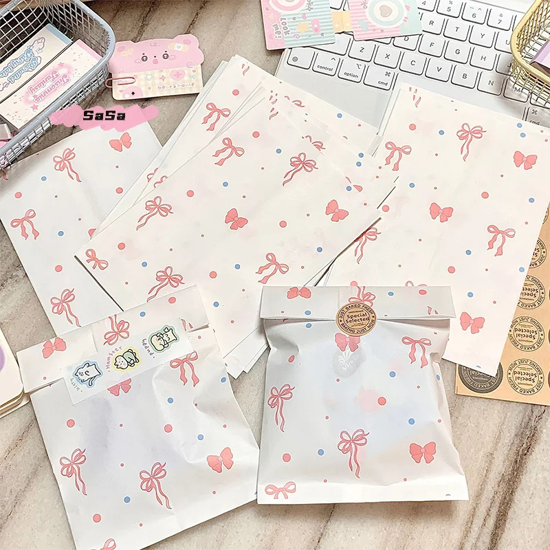50 Stück rosa Papiertüten mit Schleife und Herz, 12 x 17 cm, niedliche Fotokarten, Schmuckverpackung für handgefertigte Bastelarbeiten, Geschenkverpackungen, Aufbewahrungsbeutel Image