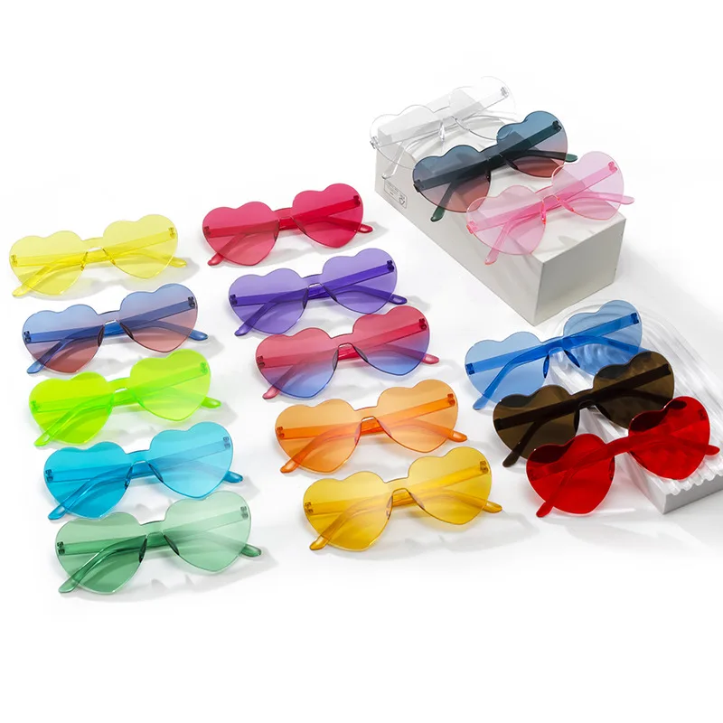Kostenloser Versand 2023 Candy Farbe Herzform Ozean Persönlichkeit Rahmenlose Kinder Sonnenbrille Fashion Candy Love Sonnenbrille Image