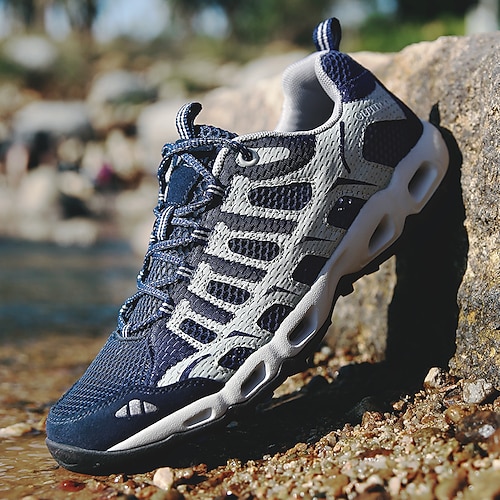 Graue und gelbe Herren-Wanderschuhe aus atmungsaktivem Mesh, schnelltrocknend, leichtes Schuhwerk für aktive Männer, geeignet für Trekking, Camping, Reisen und Outdoor-Abenteuer.