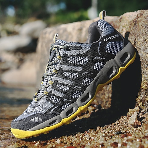 Graue und gelbe Herren-Wanderschuhe aus atmungsaktivem Mesh, schnelltrocknend, leichtes Schuhwerk für aktive Männer, geeignet für Trekking, Camping, Reisen und Outdoor-Abenteuer.