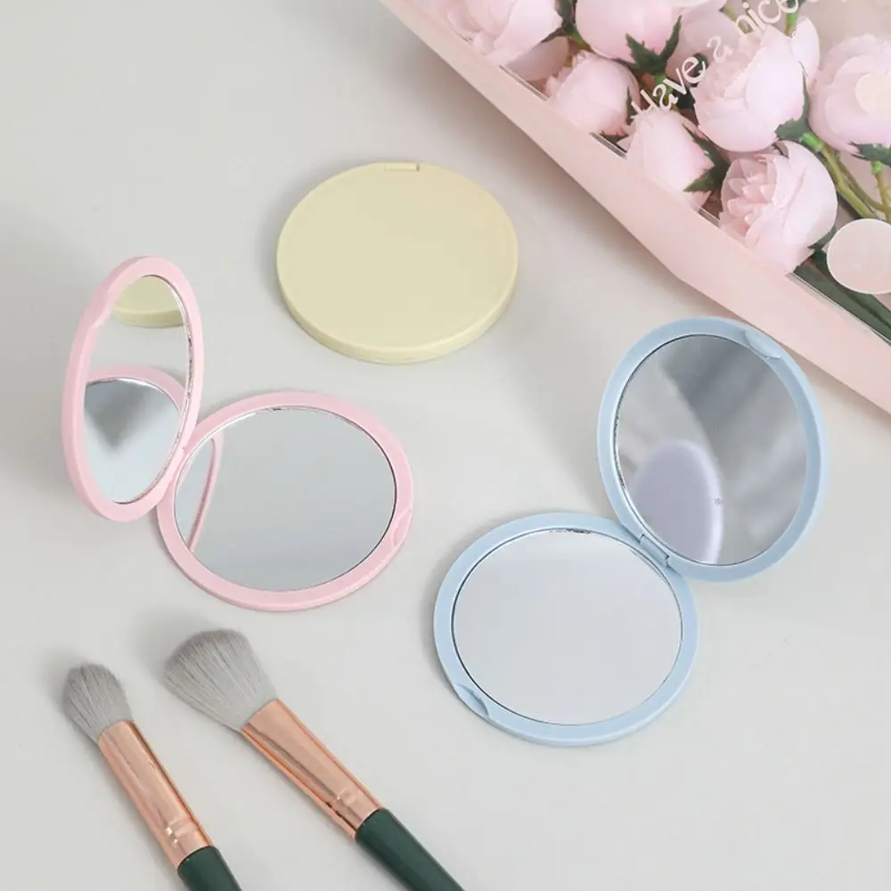 Semplice mini specchio portatile Specchio per il trucco pieghevole bifacciale Specchio tascabile portatile in plastica per studenti