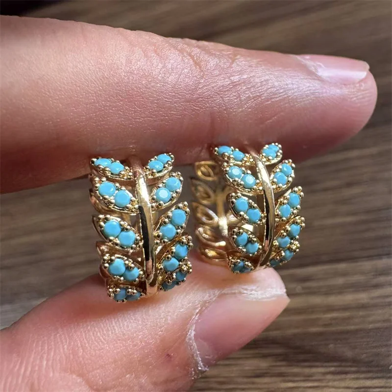 Elegante klassische synthetische Türkis-Ohrringe in Weizenform für Damen – modischer Schmuck für Bankette und Jubiläen Image