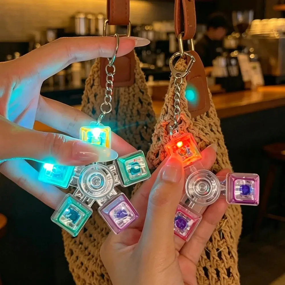Stressabbau-LED-Kreisel-Tastatur-Schlüsselanhänger, transparentes leuchtendes Fidget-Spielzeug, Schulranzen-Anhänger, Geschenk für Kinder Image
