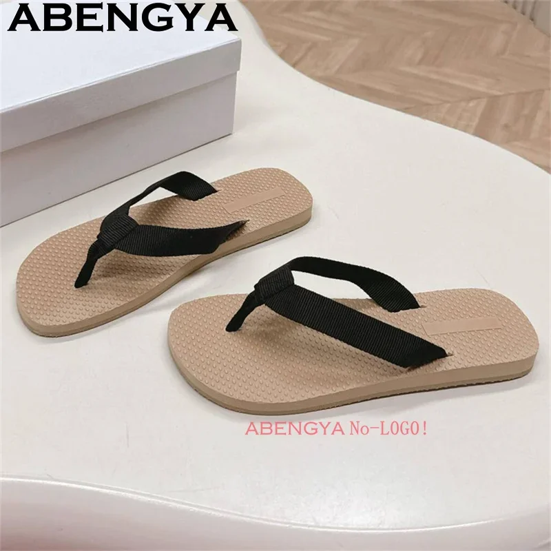 2025 sommer Neue Flip-Flops Hausschuhe Frauen 35-45 Plus Größe Runde Kappe Casual Strand Schuhe Männer Klassiker mode Maultiere Hausschuhe