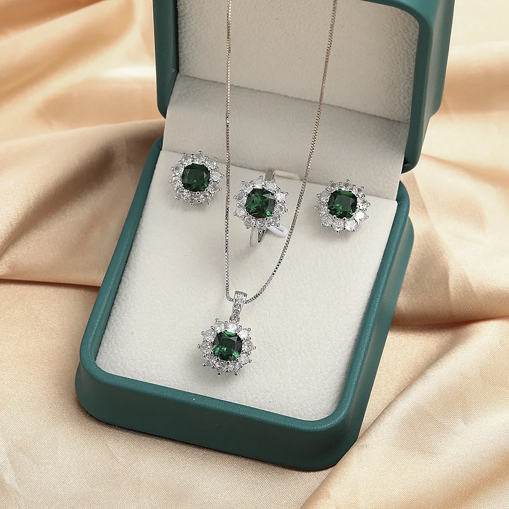 Exquisite authentische ovale Blumen-Ohrringe aus 925er Sterlingsilber mit glänzendem grünem Zirkon für Damen, klassischer Hochzeits- und Verlobungsschmuck Image