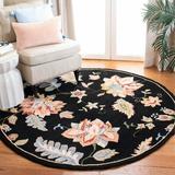 Black 66 x 0.25 in Area Rug - Lark Manor™ Hollander Floral Hand Hooked Wool Area Rug Wool | 66 W x 0.25 D in | Wayfair