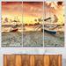 Design Art Boats at Sunset - 3 Piece Graphic Art on Wrapped Canvas Set Canvas in Yellow | 28 H x 36 W x 1 D in | Wayfair PT9203-3P