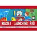 Buyenlarge Rocket Launching Pad - Advertisements Print in Blue/Green/Red | 20 H x 30 W x 1.5 D in | Wayfair 0-587-25047-xC2030