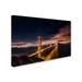 Trademark Fine Art 'Golden Gate to Stars' Photographic Print on Wrapped Canvas Metal | 22 H x 32 W x 2 D in | Wayfair 1X03054-C2232GG