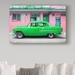 Trademark Fine Art 'Classic American Green Car in Havana' Photographic Print on Wrapped Canvas Canvas | 16 H x 24 W x 2 D in | Wayfair