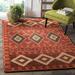 Green/Red 108 x 0.63 in Indoor Area Rug - Loon Peak® Boyd Geometric Hand-Tufted Wool Red/Multi-Color Area Rug Wool | 108 W x 0.63 D in | Wayfair