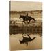 East Urban Home Oregon Cowboy Riding Horse Beside Pond w/ Two Dogs - Photograph Print on Canvas in Brown | 18 H x 12 W x 1.5 D in | Wayfair