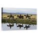 East Urban Home Oregon 'Cowboys & A Cowgirl Riding Horses Beside Pond' - Photograph Print on Canvas in White | 24 H x 36 W x 1.5 D in | Wayfair