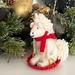 The Holiday Aisle® Sledding Unicorn Hanging Figurine Ornament in Red/White | 4.5 H x 2.5 W x 4 D in | Wayfair THLY1270 44004381