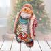 The Holiday Aisle® Fifield 2014 Santa Looking Up Derevo Collection Resin in Blue/Red/White | 5.5 H x 3 W x 3.5 D in | Wayfair
