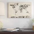 East Urban Home 'Map of the World Map from Old Clocks' Graphic Art Print Canvas in Black | 18 H x 26 W x 1.5 D in | Wayfair ESRB6938 39485891