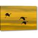 Winston Porter 'New Mexico Silhouette of Sandhill Cranes Flying' Photographic Print on Wrapped Canvas in Black/Yellow | Wayfair