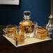 Darby Home Co Levant Monogram 5 Piece Whiskey Decanter Set Glass | 12 H x 9 W in | Wayfair EFC1E1CF4ACE4A8B96ADA79EF8573CBB