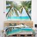 East Urban Home Seashore Palm Hanging over Sandy White Beach Tapestry w/ Hanging Accessories Included in Black/Gray | 50 H x 60 W in | Wayfair