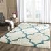 Green/White 2 in Area Rug - Harriet Bee Thorbiorn Geometric Shag Off-White/Teal Area Rug Polypropylene | 2 D in | Wayfair