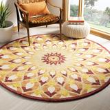 Yellow 60 x 0.5 in Indoor Area Rug - World Menagerie Round Swind Floral Handmade Tufted Wool Rust/Gold Area Rug Wool | 60 W x 0.5 D in | Wayfair