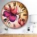 East Urban Home Fuchsia Flowers w/ Green Leaves - Traditional wall clock Metal in Green/Pink | 23 H x 23 W x 1 D in | Wayfair